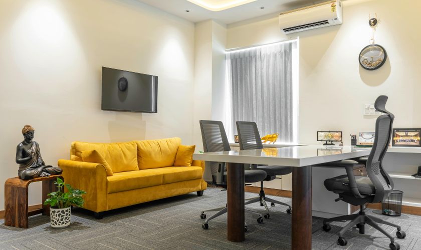 Premium corporate office furniture Bangalore — reception sofa and corporate cabin furniture display