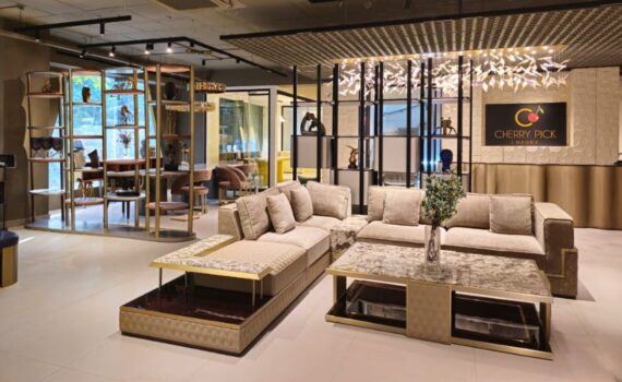 Furniture styles for Bangalore apartments — contemporary style living room with leather sofa and marble centre table