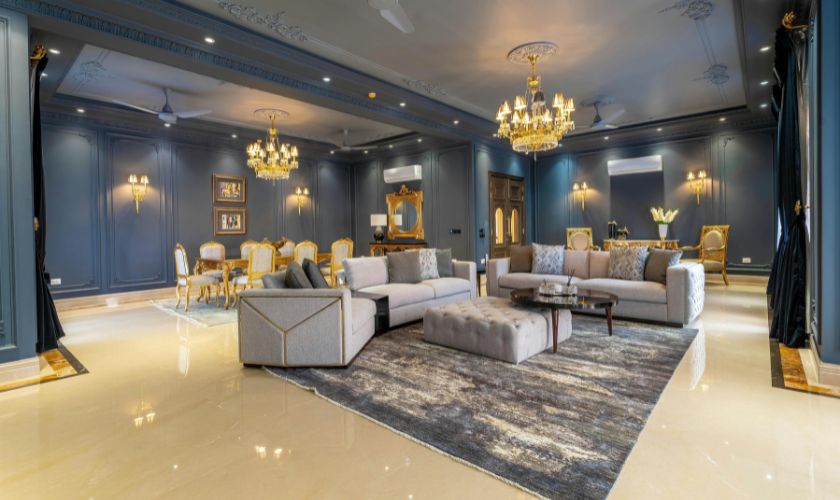 Sofa colour guide Bangalore — warm grey fabric sofa in neutral Bangalore 2BHK living room with natural light
