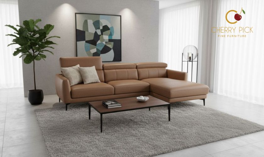 Leather vs fabric sofa for Indian homes — Italian leather sofa showing natural grain and patina development over time