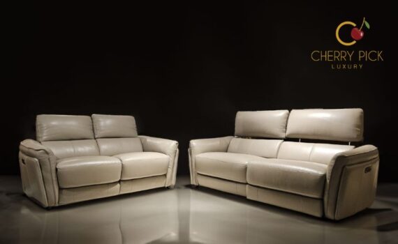 Luxury furniture for villa Bangalore — grand living room with Italian leather sectional sofa and marble centre table in Koramangala villa