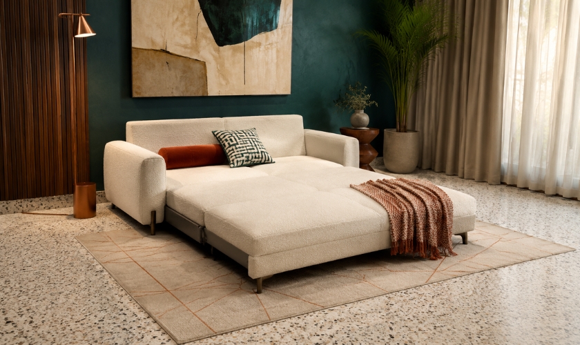 Convertible sofa as space saving furniture showing open footprint clearance requirements