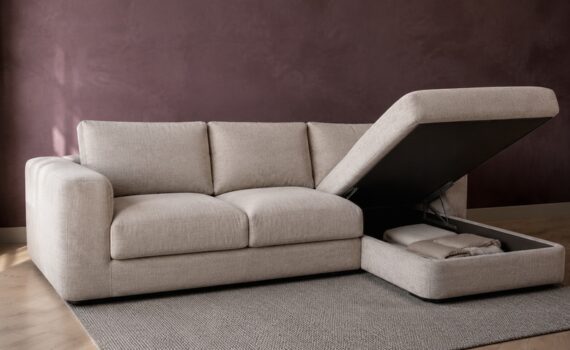 Sofa shoes storage bench in an Indian entryway with lift-top compartment open